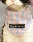 Close-up of pink plaid bandana details,